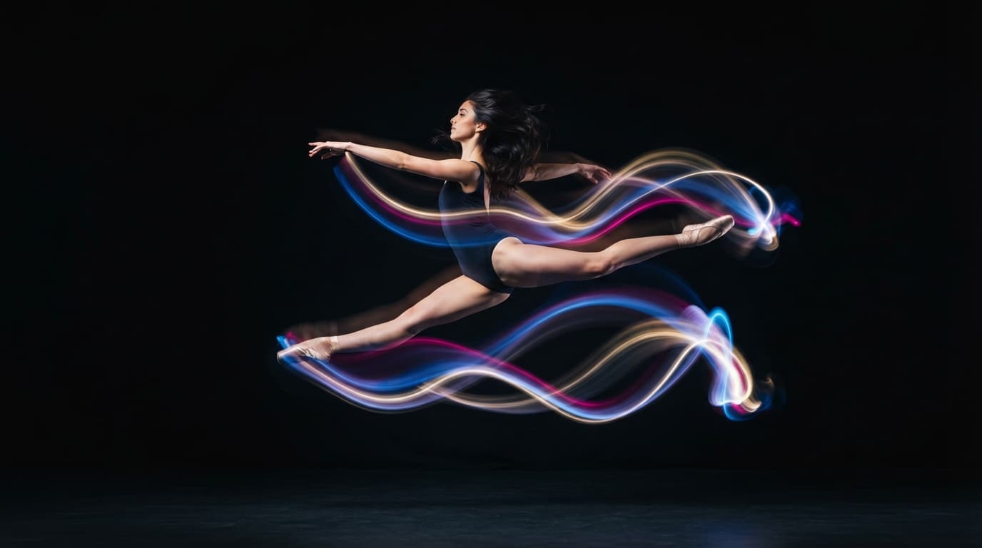Ballerina wrapped in long-exposure light trails